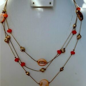 Charming Charlie’s Peach color stones & beads in stations on necklace/gold tone